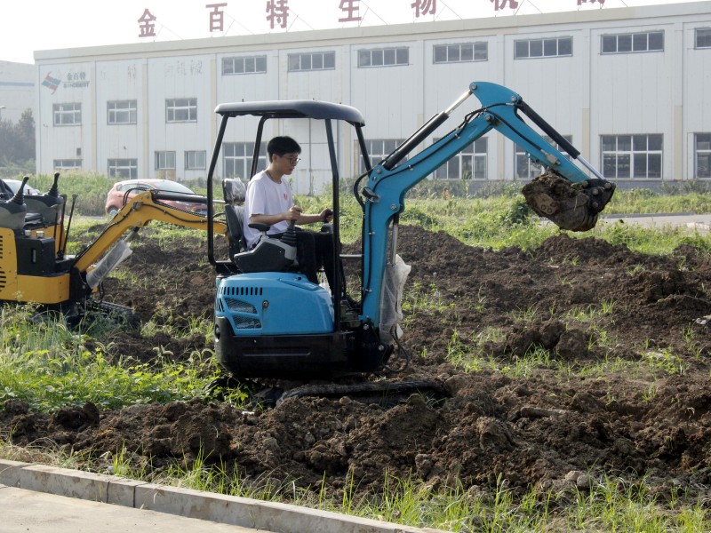 Mini excavator equipped with breaker hammer.jpg